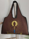 Boho Spirit canvas bag, meditation symbol print in brown and gold, flat lay